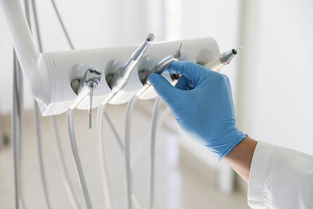 Professional Root Canal Treatment technician working in Muniz, TX